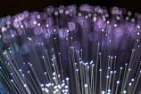 Físicos quebram recorde ao teletransportar informação quântica por 100 km de fibra